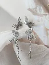 silver earrigs butterfly.webp