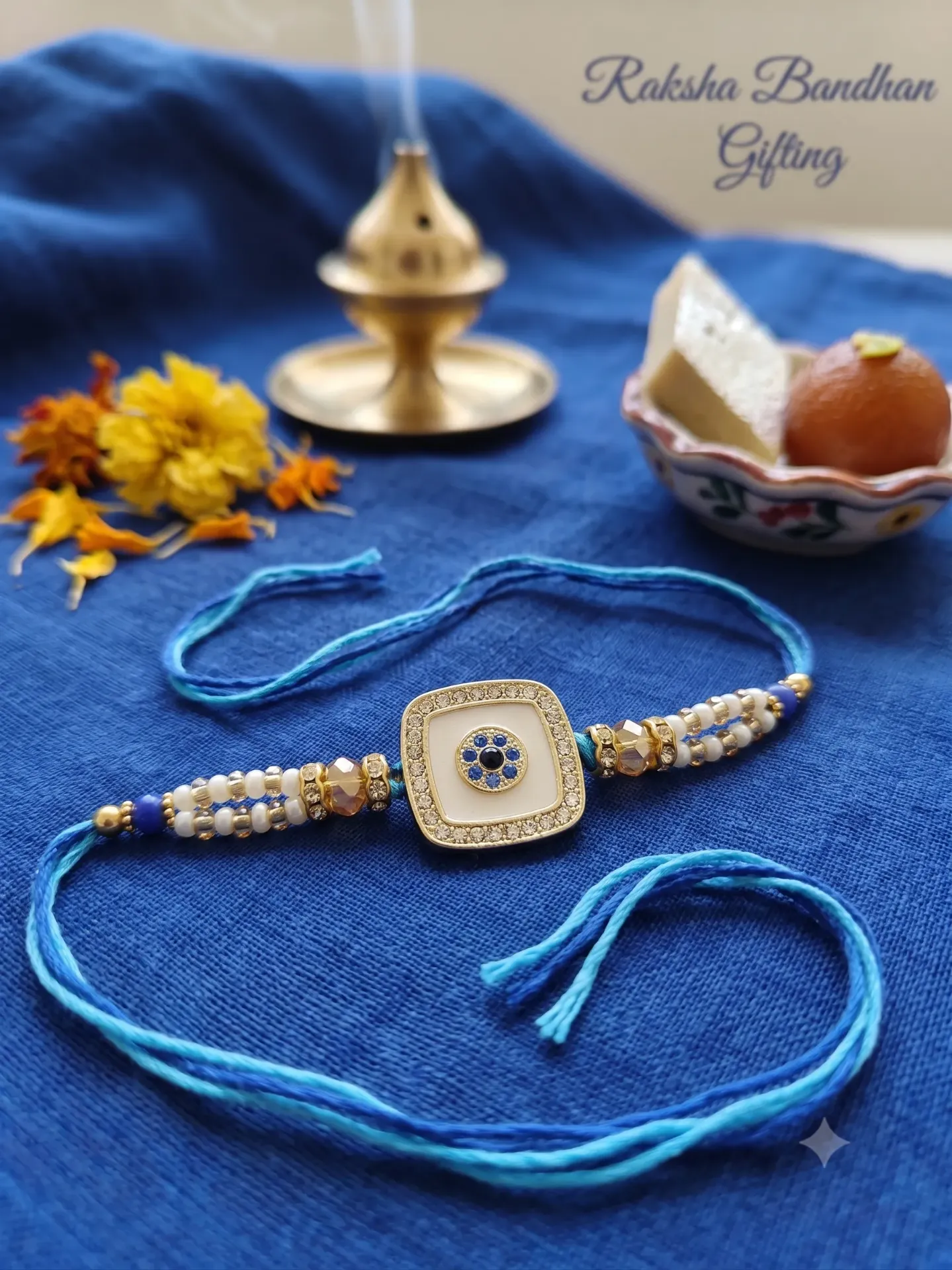 Royal Blue Evil Eye Rakhi with Crystal & Bead Detailing