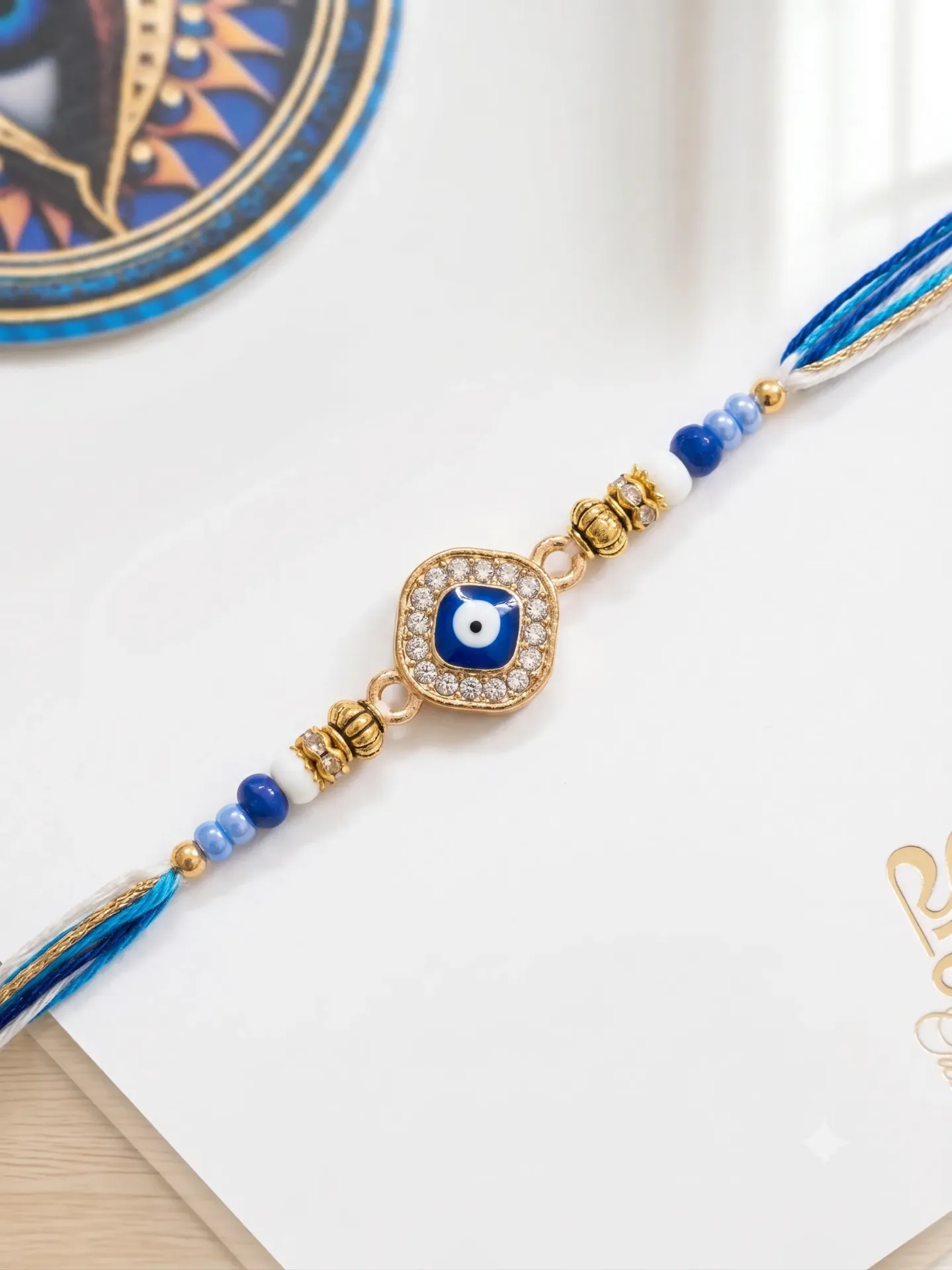 Blue Evil Eye Protection Rakhi - Gold Plated Rhinestone Square Charm Rakhi for Brother