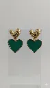 Elegant gold-tone earrings featuring sculpted heart tops paired with glossy emerald-green heart drops