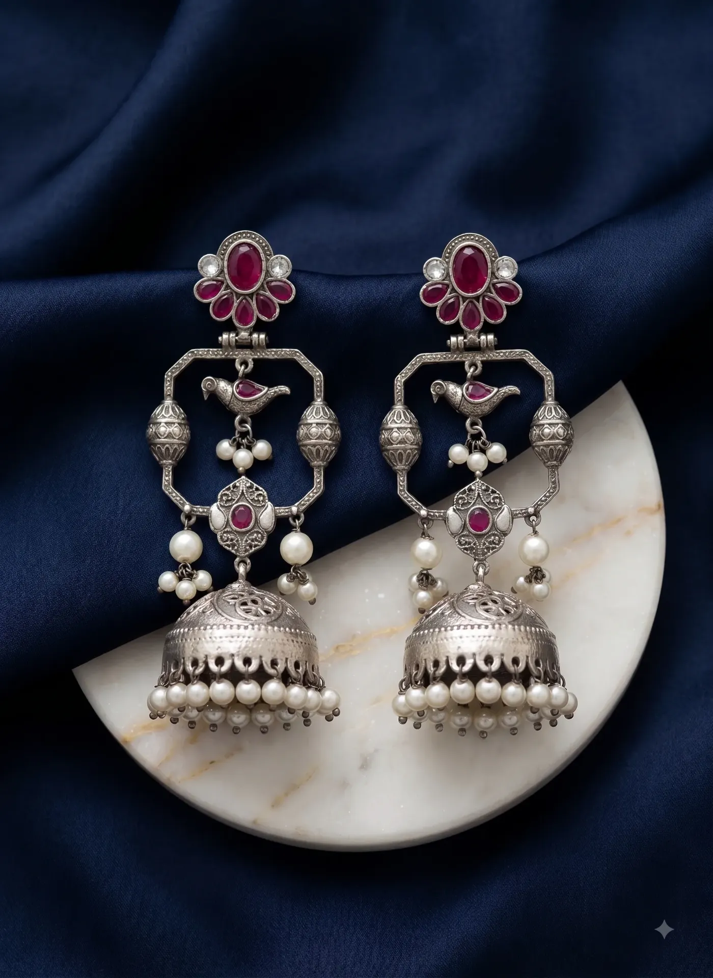 Royal Floral Jhumkas: Oxidized Silver & Ruby-Red Stone Statement Earrings